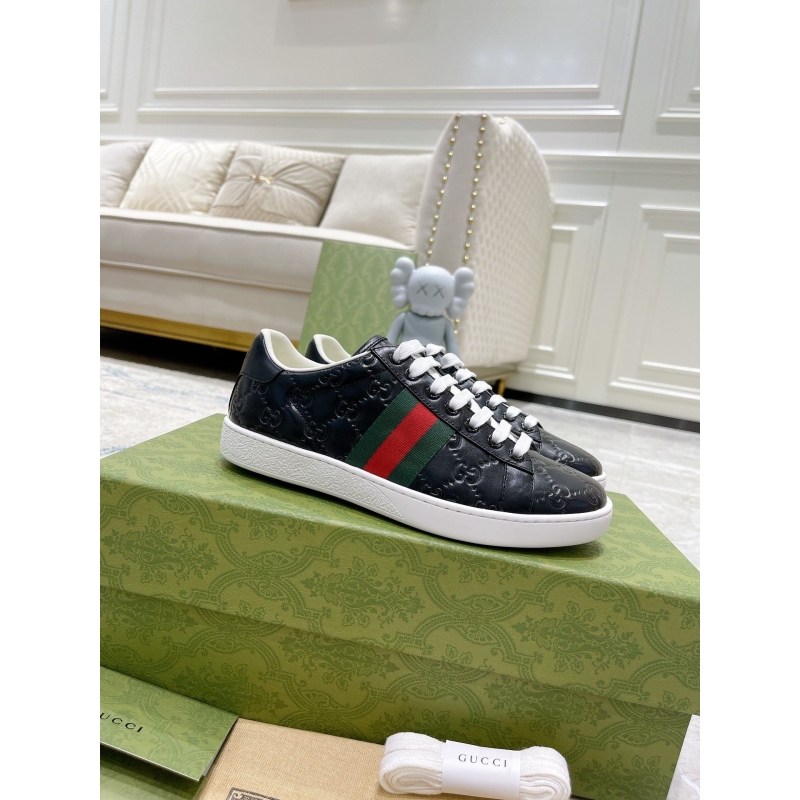 G*u*i sneakers